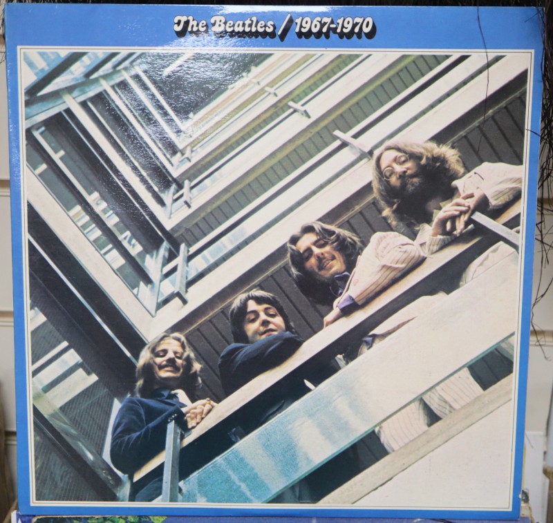A Collection of 60s/& 70s singles including Beatles EPs and a small quantity of LPs